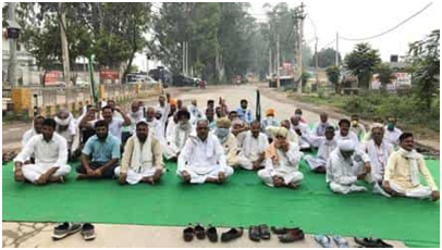 Haryana farmers block highways and a railway line against farm reform bills