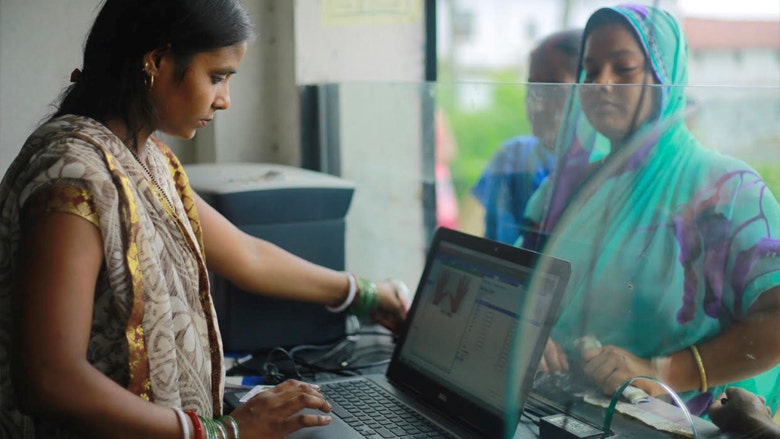 Puja Kumari, a JEEViKA banking correspondent, serving customers in Danapur, Bihar
